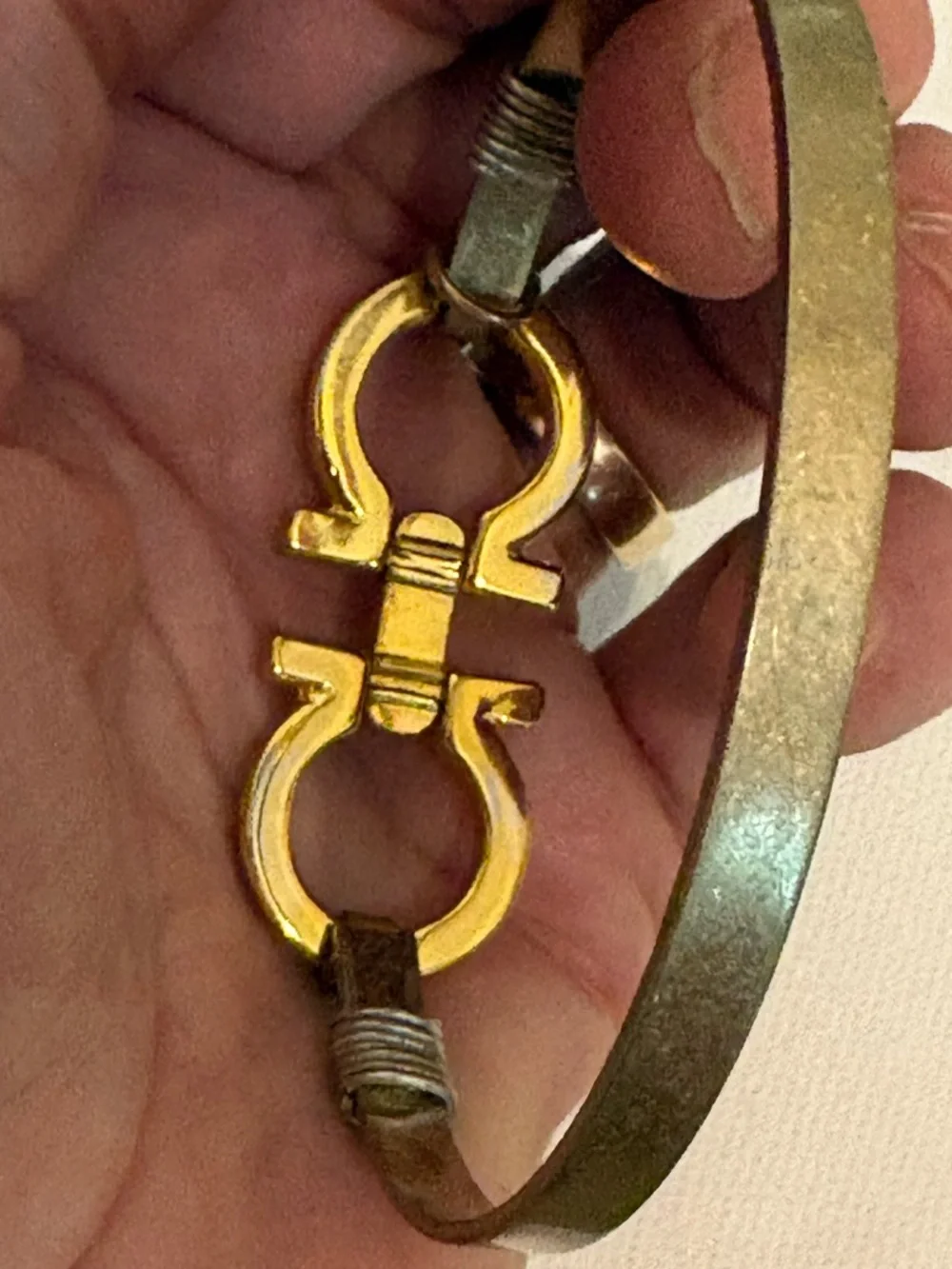 Authentic Salvatore Ferragamo charm set on unbranded bangle bracelet